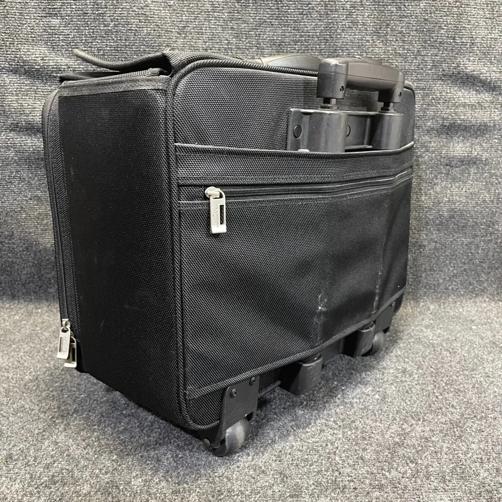 US Luggage New York Black Ballistic Nylon Rolling Catalog Case Wheeled Briefcase
